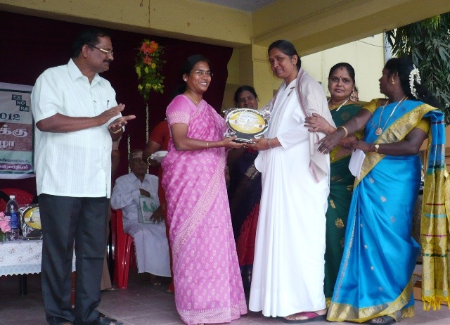Sis. B K Uma being felicitated as 'Best Achiever Award'