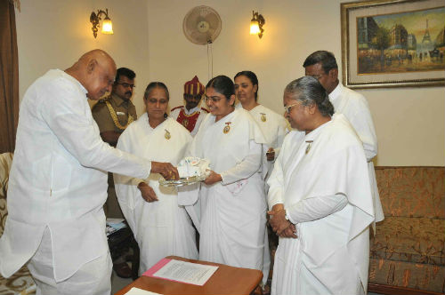 Tying Rakhi to Chennai Governor Dr. K. Rosaiah