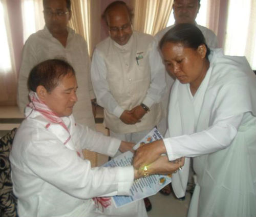 Tying Rakhi to Chief Minister of Arunachal Pradesh