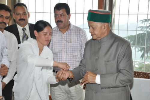 Tying Rakhi to Chief Minister of Himachal Pradesh