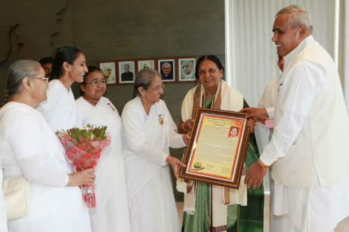 Felicitation of CM Mrs. Anandiben Patel of Gujarat State